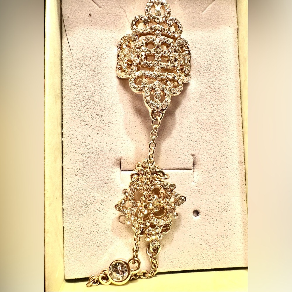 Beautiful Gold-Plated Ring with Bracelet Attachment